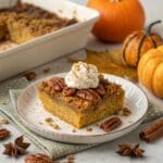 a golden brown pumpkin dump cake with a crunchy pe - Delicious Pumpkin Dump Cake Recipe - Easy & Irresistible