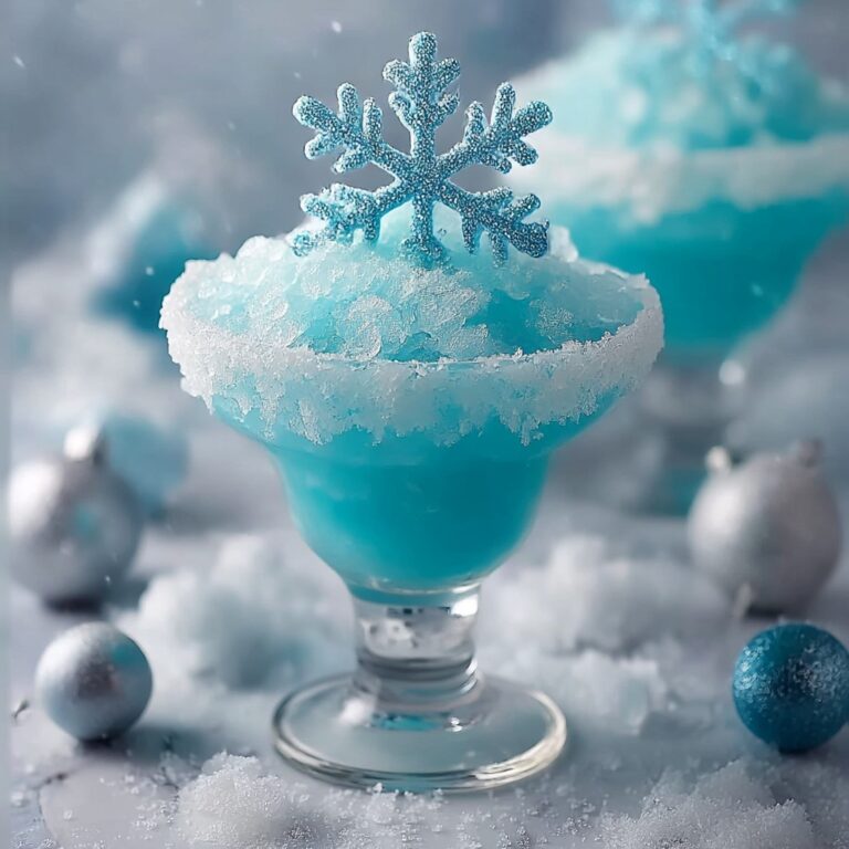 Jack Frost Winter Cocktail: A Festive Coconut Pineapple Blue Lagoon Recipe