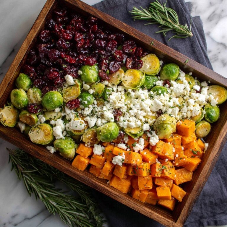 Cranberry-Glazed Roasted Butternut Squash, Brussels Sprouts, and Sweet Potato Salad with Goat Cheese Recipe